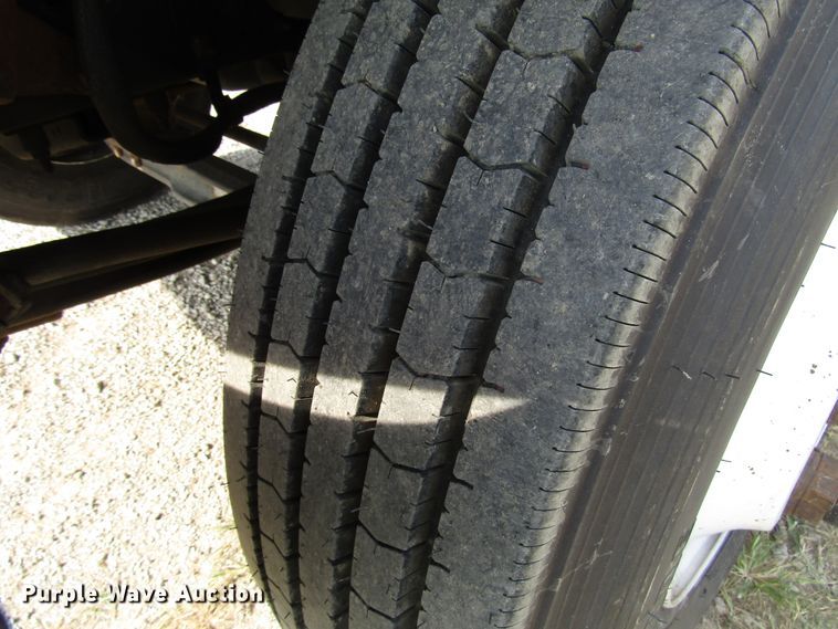 image for item DE2401 2006 GMC C7500 flat dump bed truck