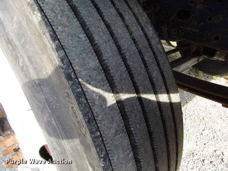 image for item DE2401 2006 GMC C7500 flat dump bed truck