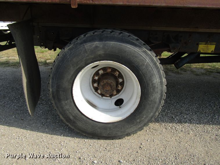 image for item DE2401 2006 GMC C7500 flat dump bed truck