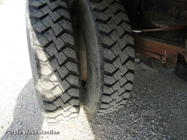 image for item DE2401 2006 GMC C7500 flat dump bed truck