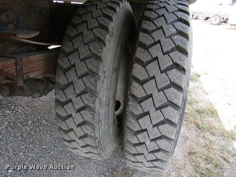 image for item DE2401 2006 GMC C7500 flat dump bed truck