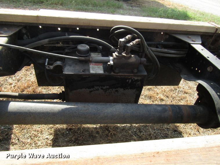 image for item DE2401 2006 GMC C7500 flat dump bed truck