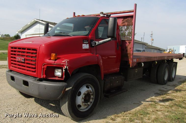 image for item DE2402 2005 GMC C8500 flat dump bed truck