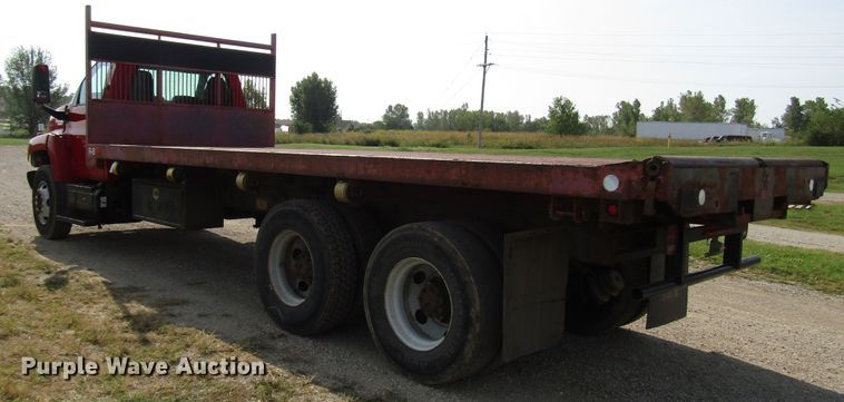 image for item DE2402 2005 GMC C8500 flat dump bed truck