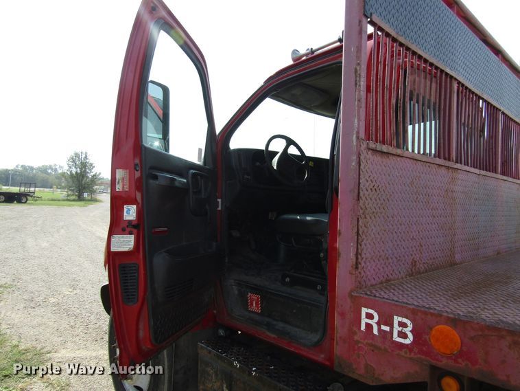 image for item DE2402 2005 GMC C8500 flat dump bed truck