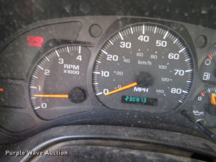 image for item DE2402 2005 GMC C8500 flat dump bed truck