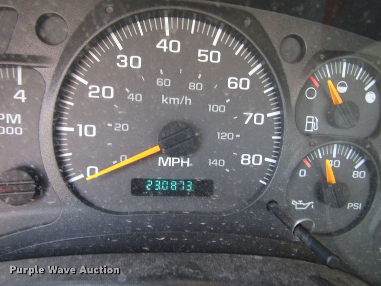 image for item DE2402 2005 GMC C8500 flat dump bed truck