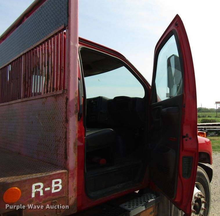image for item DE2402 2005 GMC C8500 flat dump bed truck