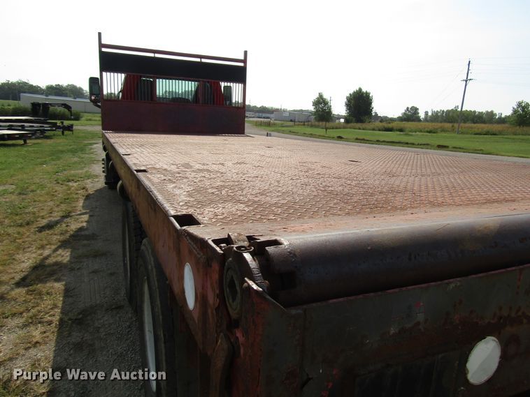 image for item DE2402 2005 GMC C8500 flat dump bed truck