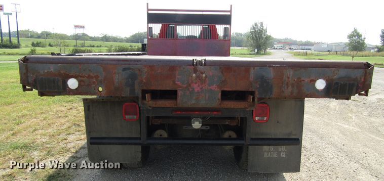 image for item DE2402 2005 GMC C8500 flat dump bed truck