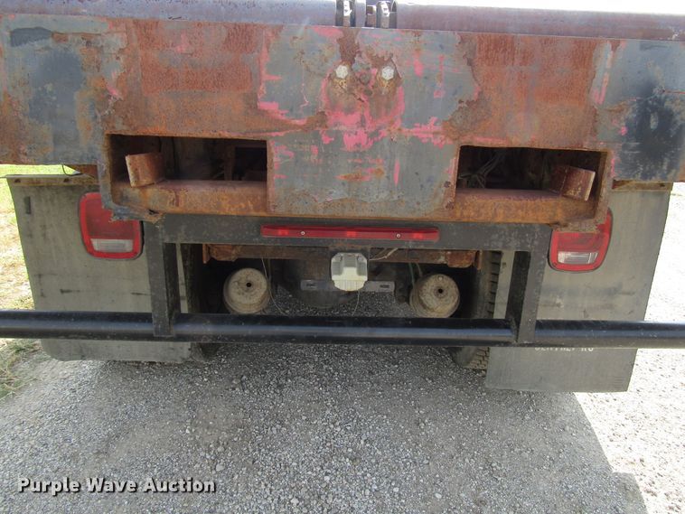 image for item DE2402 2005 GMC C8500 flat dump bed truck