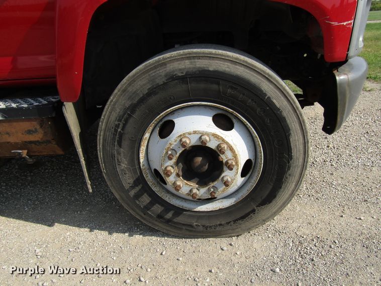 image for item DE2402 2005 GMC C8500 flat dump bed truck