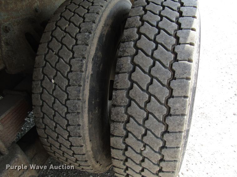 image for item DE2402 2005 GMC C8500 flat dump bed truck