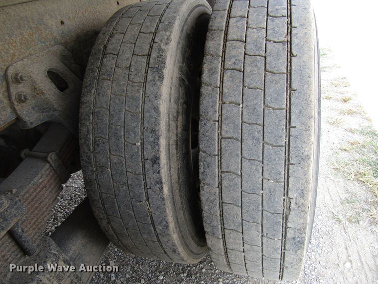 image for item DE2402 2005 GMC C8500 flat dump bed truck