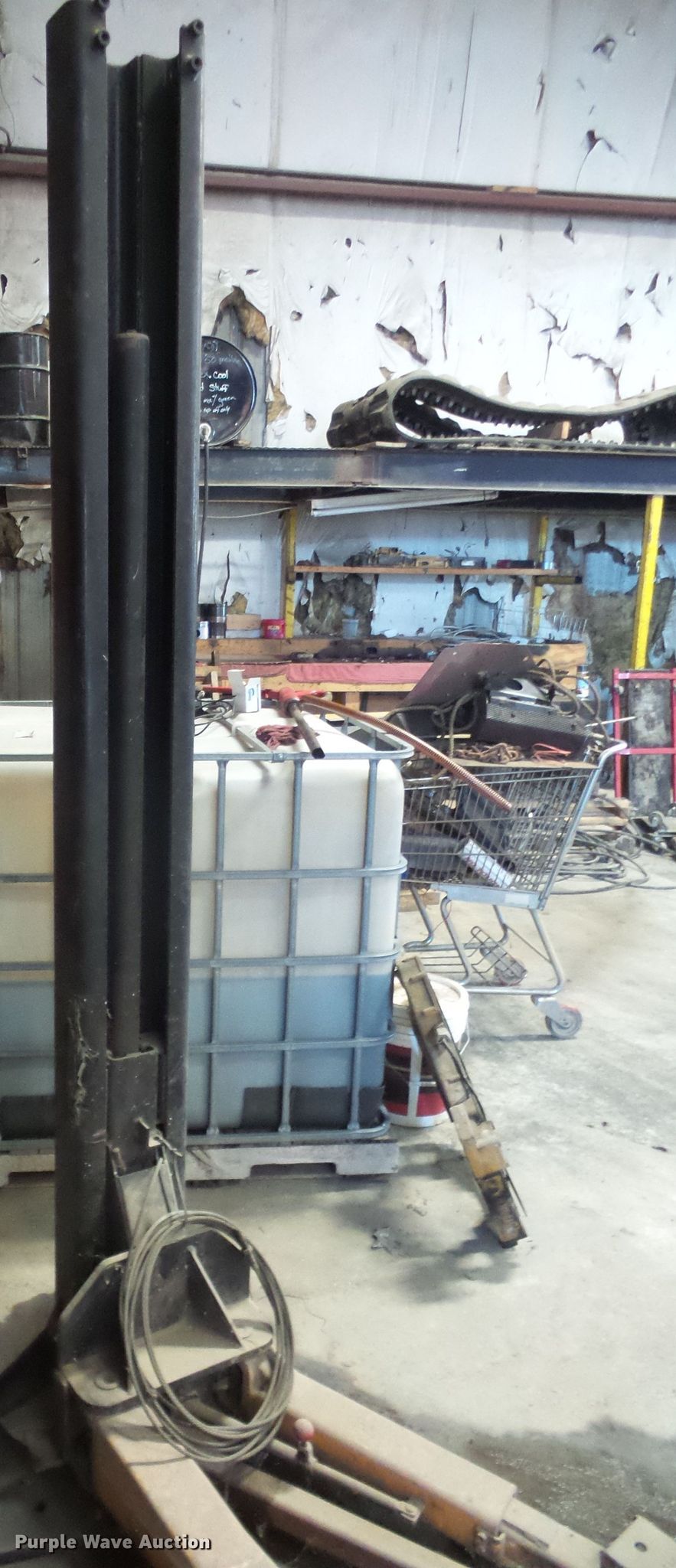 Two post automotive lift in Lebo, KS Item FB9327 sold Purple Wave