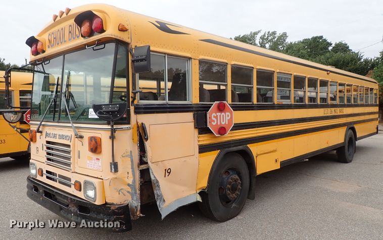 image for item DB7720 1999 Blue Bird TC2000 school bus