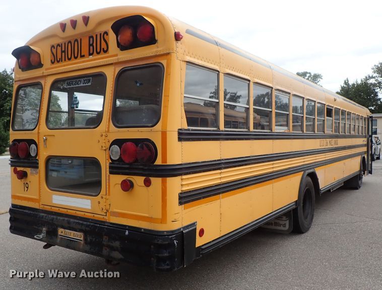 image for item DB7720 1999 Blue Bird TC2000 school bus