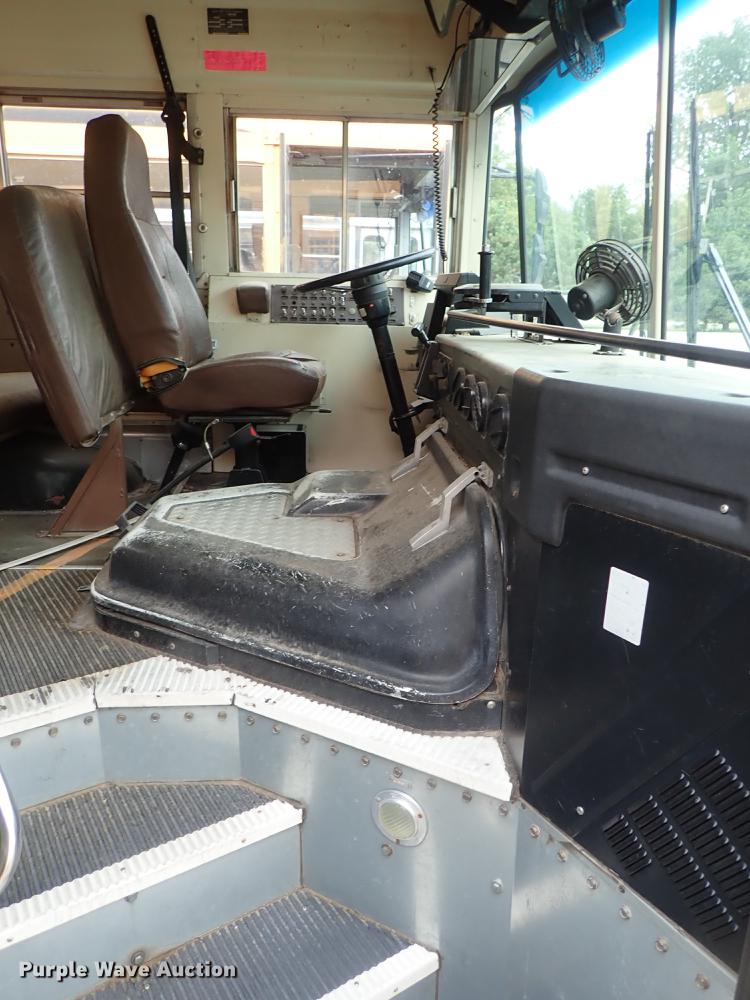 image for item DB7720 1999 Blue Bird TC2000 school bus