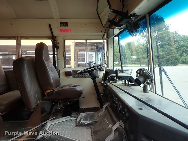 image for item DB7720 1999 Blue Bird TC2000 school bus