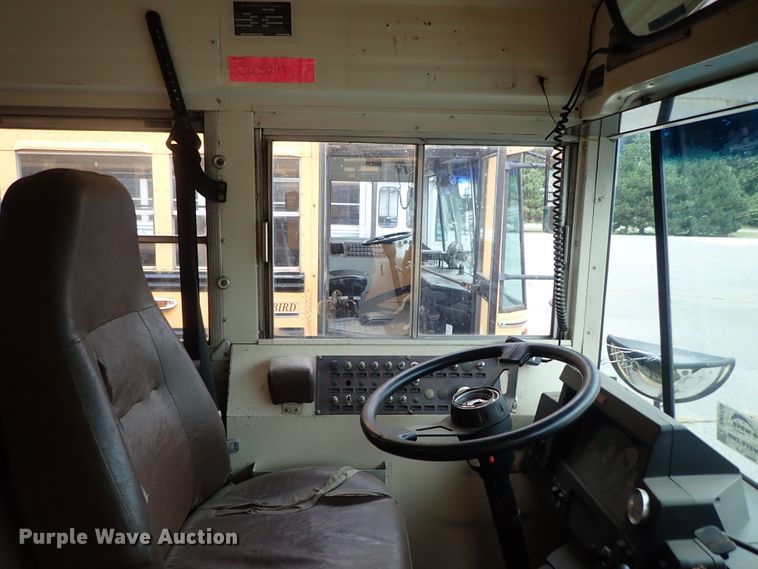 image for item DB7720 1999 Blue Bird TC2000 school bus