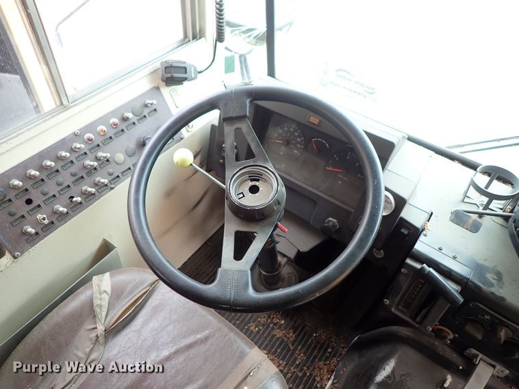 image for item DB7720 1999 Blue Bird TC2000 school bus