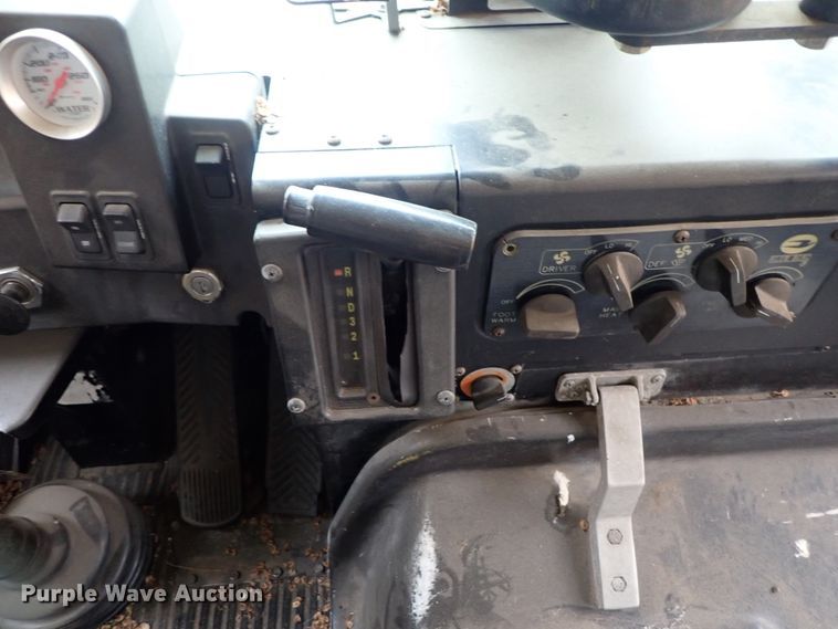 image for item DB7720 1999 Blue Bird TC2000 school bus