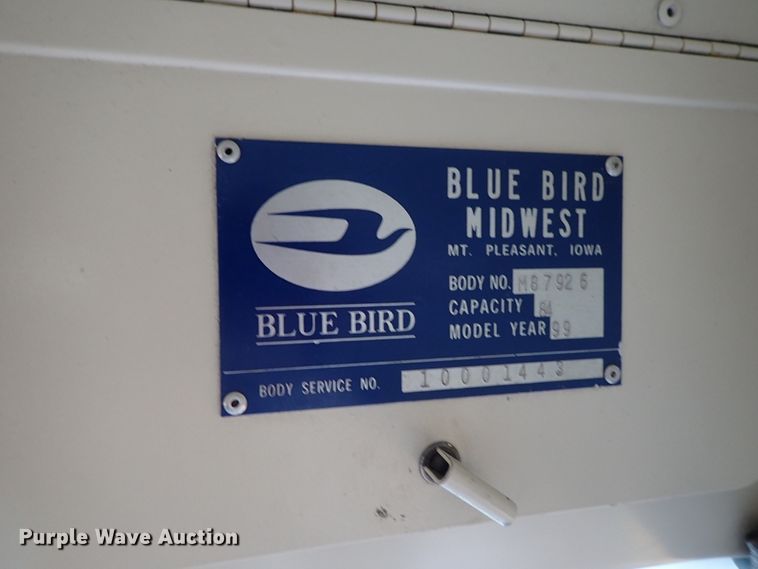 image for item DB7720 1999 Blue Bird TC2000 school bus