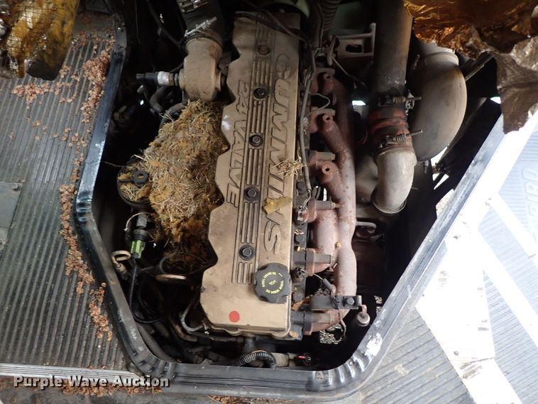 image for item DB7720 1999 Blue Bird TC2000 school bus