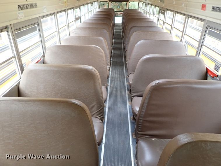 image for item DB7720 1999 Blue Bird TC2000 school bus