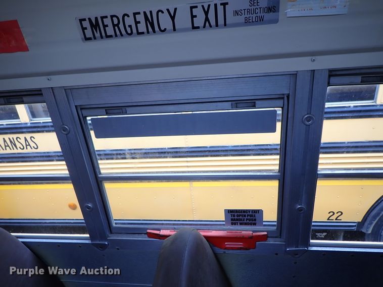 image for item DB7720 1999 Blue Bird TC2000 school bus