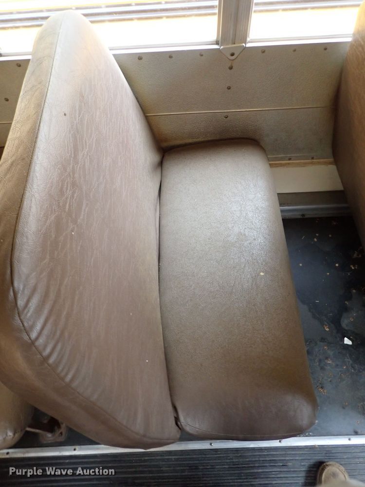 image for item DB7720 1999 Blue Bird TC2000 school bus