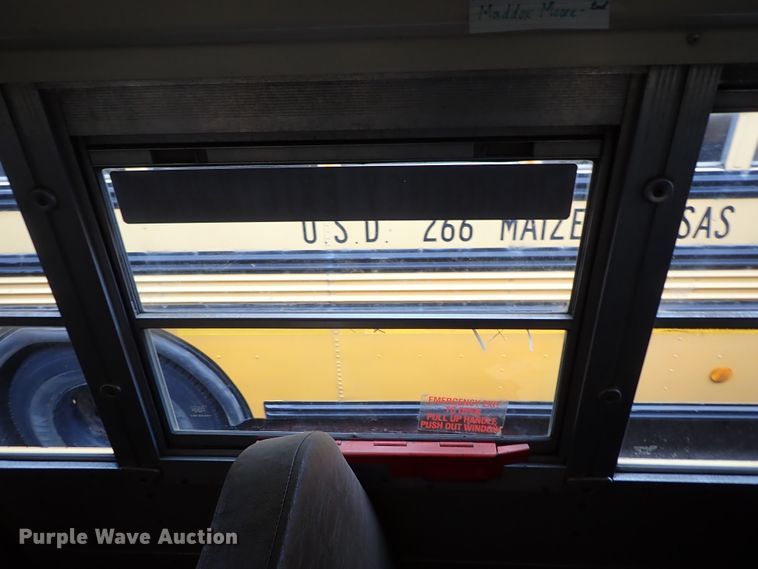 image for item DB7720 1999 Blue Bird TC2000 school bus