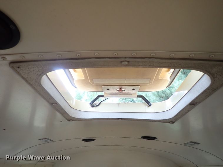 image for item DB7720 1999 Blue Bird TC2000 school bus