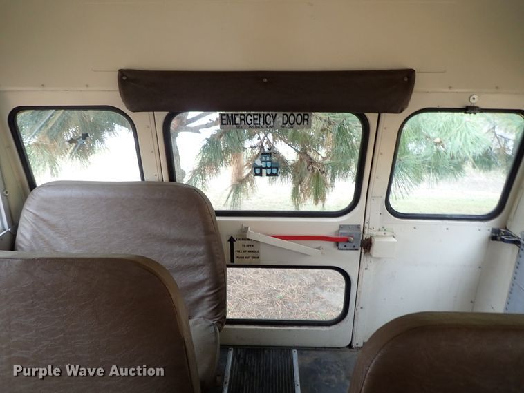 image for item DB7720 1999 Blue Bird TC2000 school bus