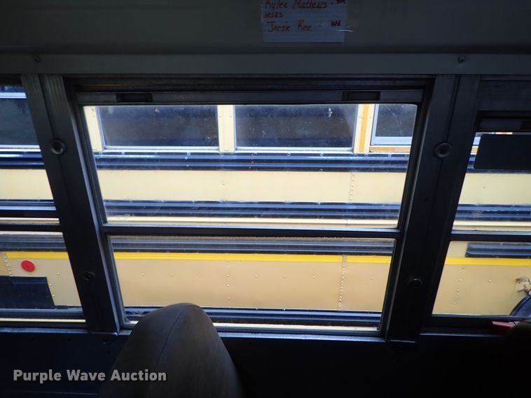 image for item DB7720 1999 Blue Bird TC2000 school bus