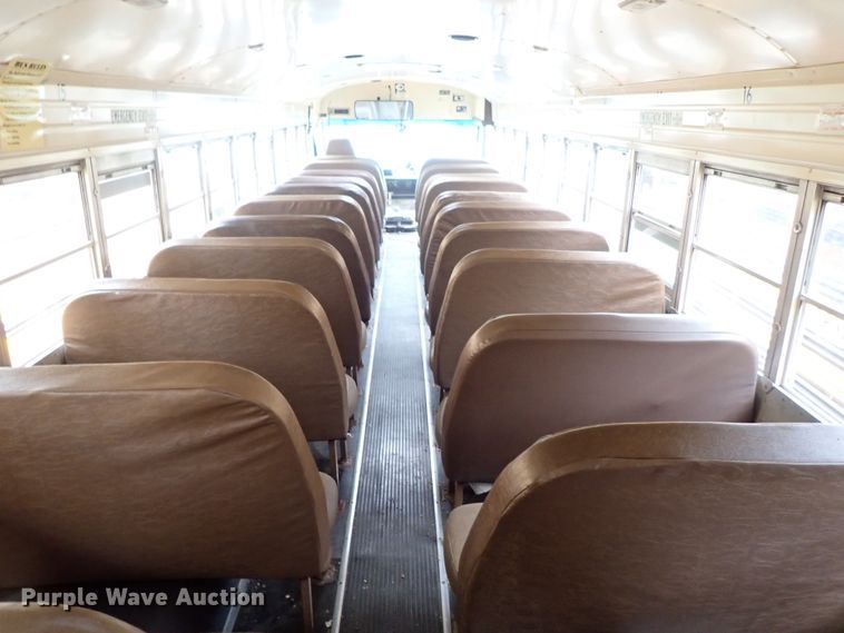 image for item DB7720 1999 Blue Bird TC2000 school bus