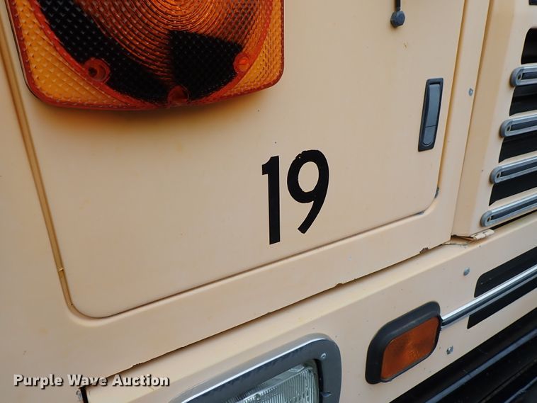 image for item DB7720 1999 Blue Bird TC2000 school bus