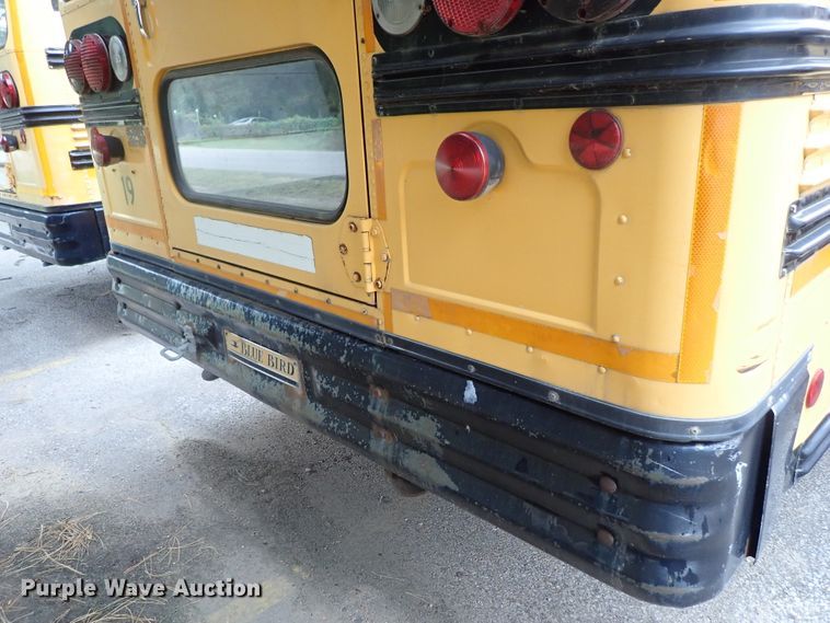 image for item DB7720 1999 Blue Bird TC2000 school bus