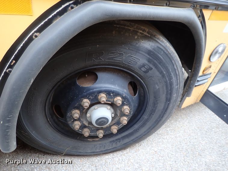 image for item DB7720 1999 Blue Bird TC2000 school bus