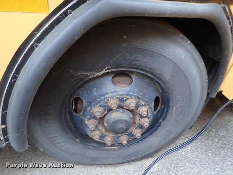 image for item DB7720 1999 Blue Bird TC2000 school bus