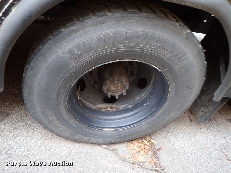 image for item DB7720 1999 Blue Bird TC2000 school bus