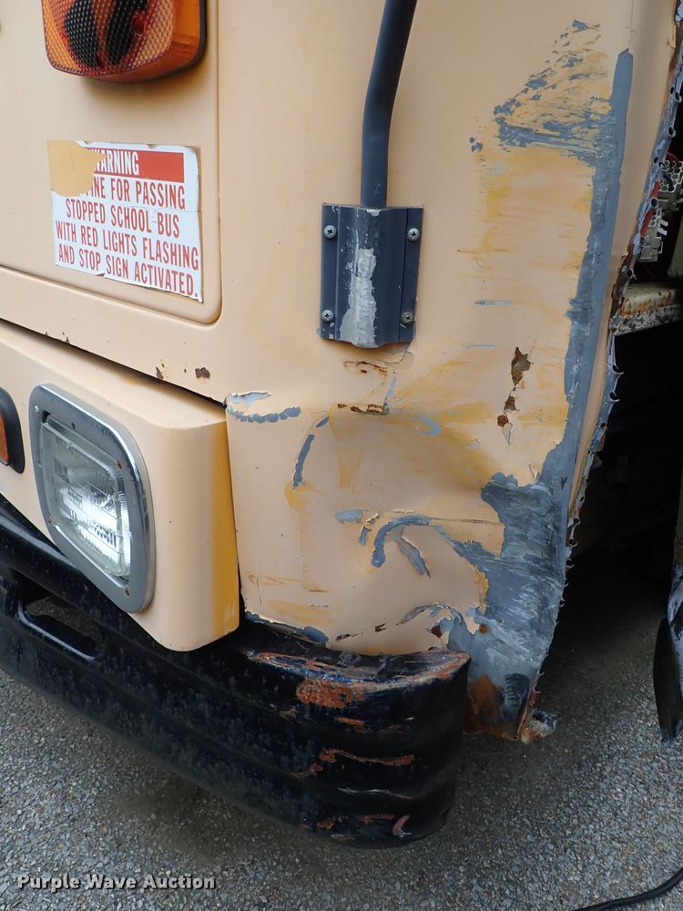 image for item DB7720 1999 Blue Bird TC2000 school bus