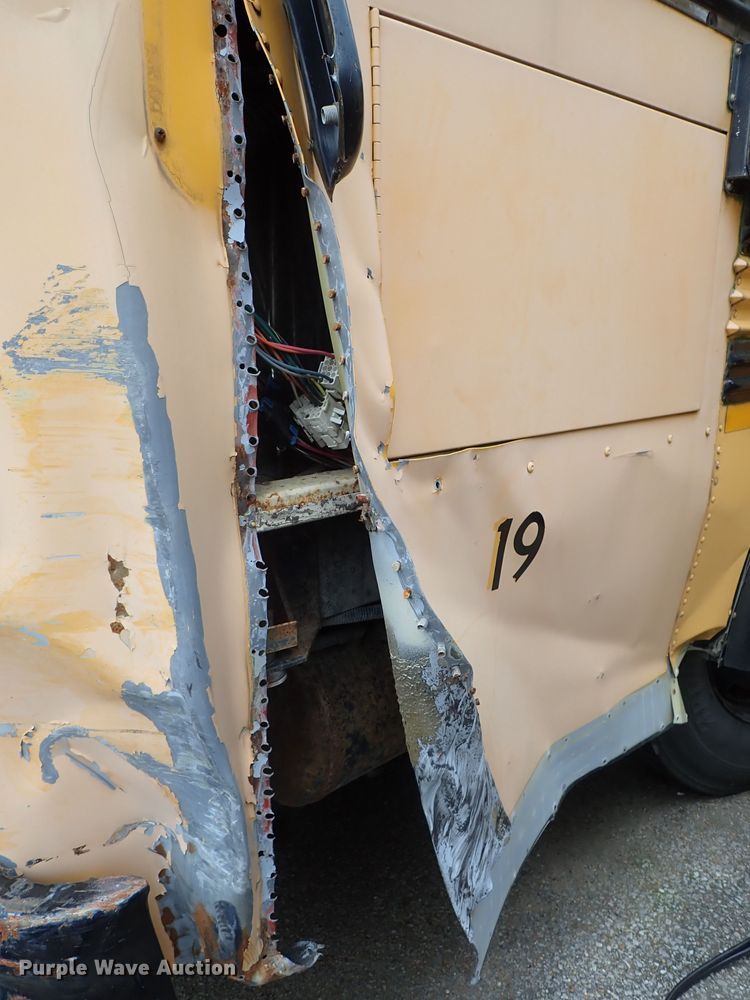 image for item DB7720 1999 Blue Bird TC2000 school bus