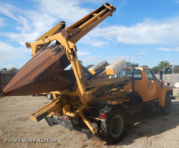 image for item DD4457 1991 Ford F600 truck with Vermeer tree spade