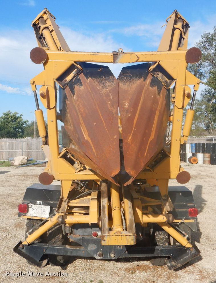 image for item DD4457 1991 Ford F600 truck with Vermeer tree spade