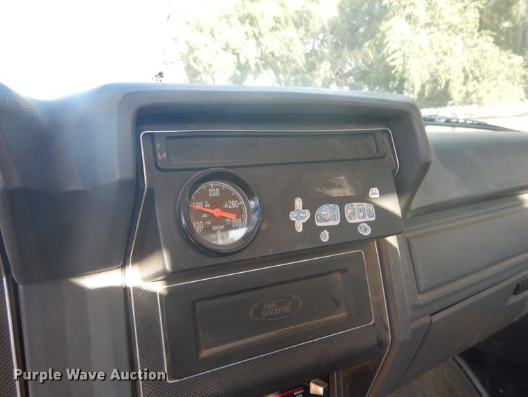 image for item DD4457 1991 Ford F600 truck with Vermeer tree spade