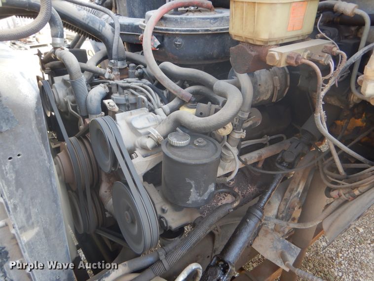 image for item DD4457 1991 Ford F600 truck with Vermeer tree spade