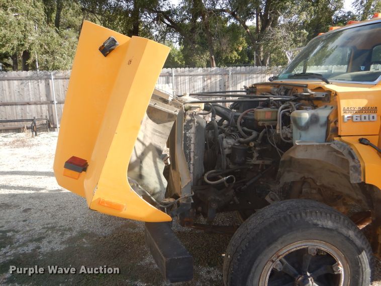 image for item DD4457 1991 Ford F600 truck with Vermeer tree spade