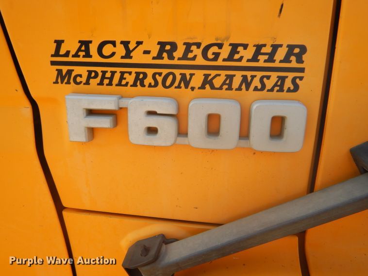 image for item DD4457 1991 Ford F600 truck with Vermeer tree spade