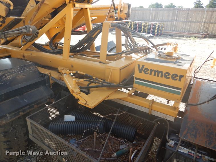 image for item DD4457 1991 Ford F600 truck with Vermeer tree spade